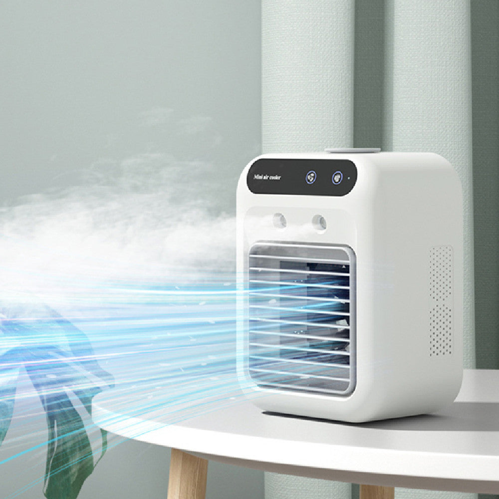 Air Conditioner Air Cooler Fan blowing cool mist from a portable design on a table with plants in the background.